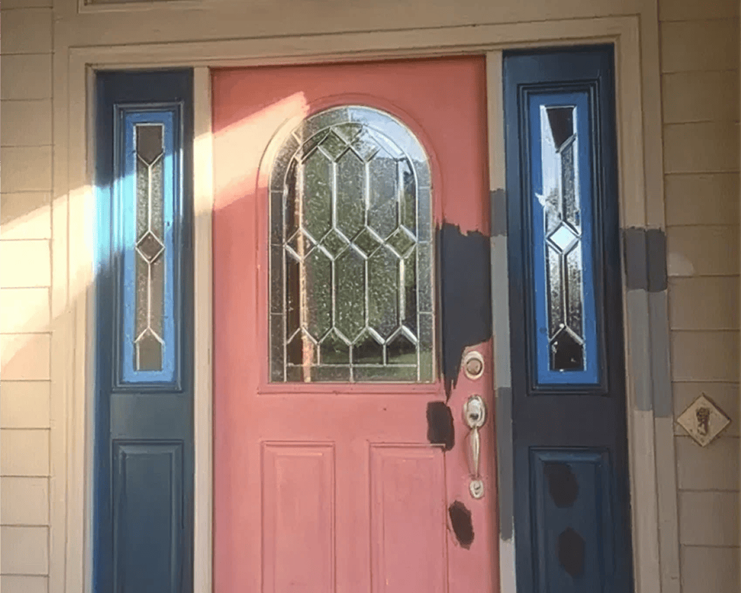 Pink door with blue sidelights